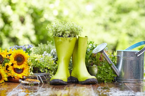 Trained gardeners in Aldgate using safe working practices