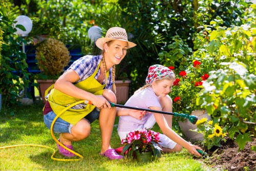 Urban garden care in Aldgate with healthy plants and tidy borders